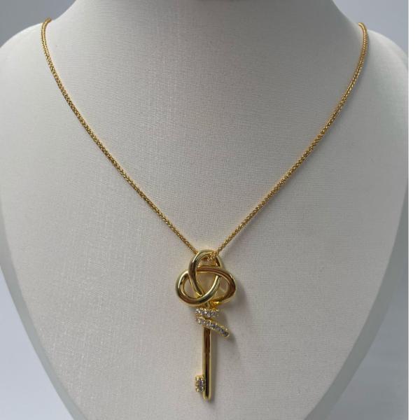 COLLAR PLATEADO TIFFANNY & CO DISEÑO LLAVE DORADO