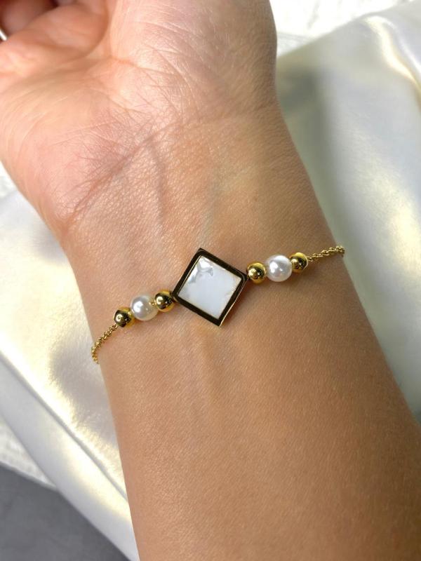 PULSERA DE ACERO DORADA CUADRO BLANCO