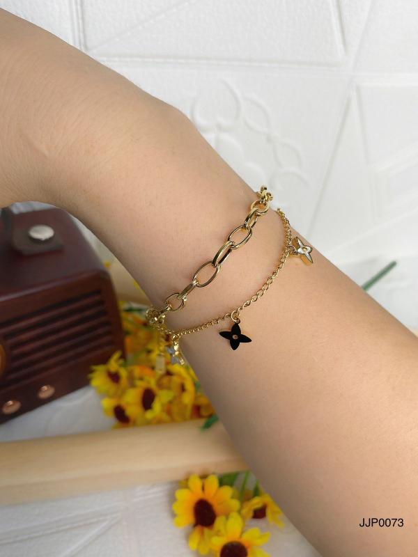 [PD-JJP0073] PULSERA DE ACERO DORADA FLOR BLANCA/LV